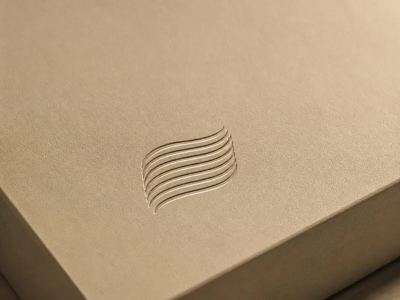 The Celiform mark debossed, pressed in, on a sand-coloured box lid